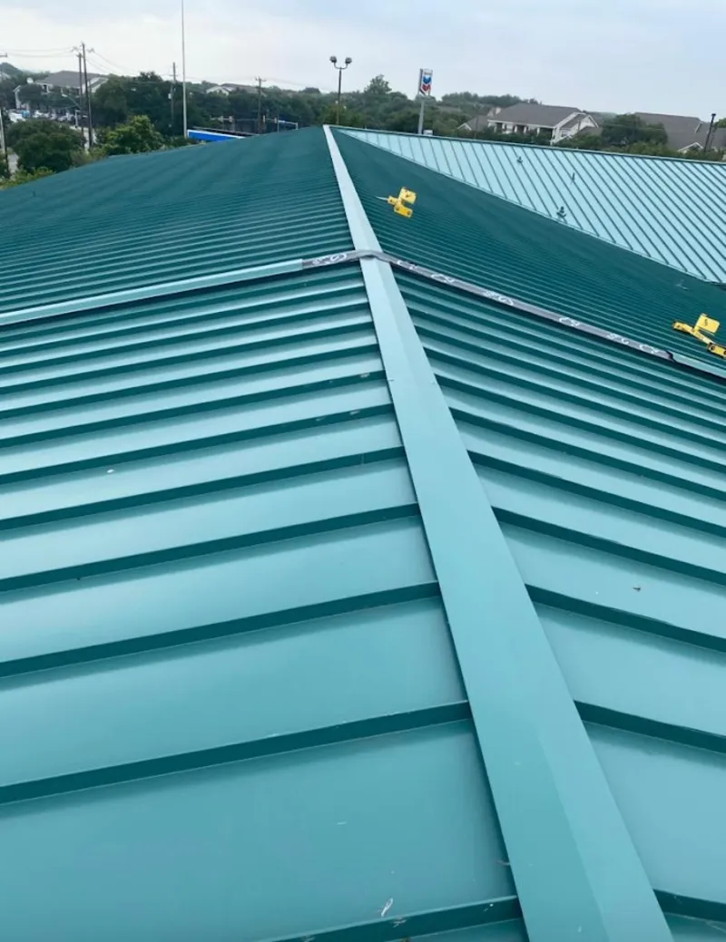 Green commercial metal roof ridge and valley for Metal Roof Repair in Fairfield